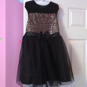 Girl’s size 8 sequined black dress